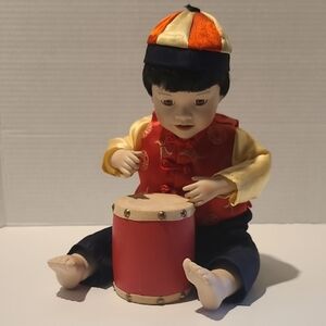 Traditional Drumming Doll with Red and Yellow Outfit